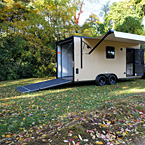 Sahara Tan E-Series Camper with rear ramp open